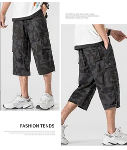 Close-up detail of men's loose camouflage cargo shorts featuring multi-pocket design