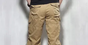 Close-up back view of men's khaki cargo shorts featuring a functional multi-pocket design