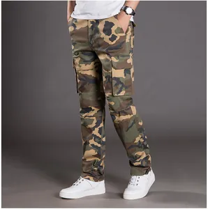 Detailed view of men's camouflage cargo pants with side flap pockets and relaxed fit.