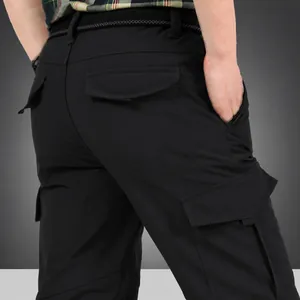 Men's outdoor fleece-lined cargo pants with multiple pockets for winter hiking