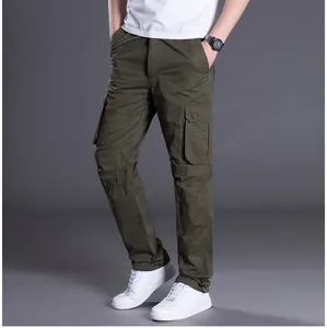 Detailed view of men's olive green multi-pocket cargo pants in a relaxed straight fit