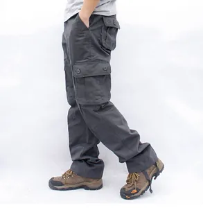 Side profile detail of durable men's dark grey loose multi-pocket cargo pants for outdoor work