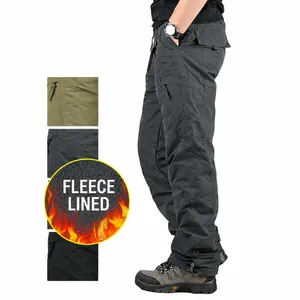 Winter men's thermal fleece lined cargo pants for outdoor activities in charcoal grey