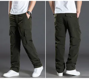 Front and back detail view of dark olive green outdoor softshell cargo pants for men