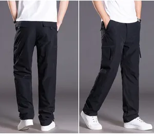 Detailed view of men's black waterproof cargo pants from back and side angles