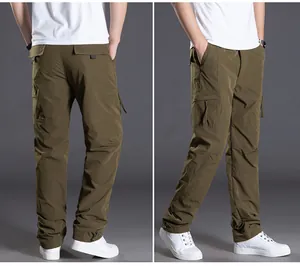 Detailed views of olive green windproof waterproof softshell cargo pants for men
