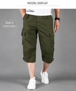Detail shot of men's loose fit army green cargo shorts made of pure cotton fabric