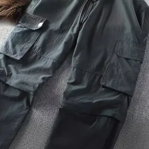 Men's lightweight outdoor cargo pants with functional multi-pockets and loose straight-leg fit