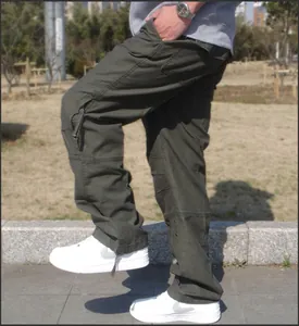 Loose fit olive green men's multi-pocket cargo pants perfect for outdoor casual wear