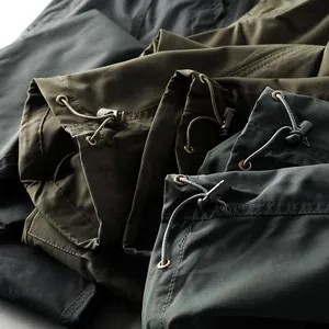 Macro detail view of adjustable drawstring cuffs on tactical outdoor cargo pants
