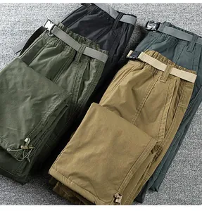 Detail view of durable waterproof fleece softshell pants in multiple colors with belts