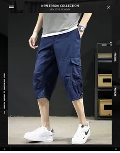 Detailed view of navy blue cargo seven-point pants for men in a casual fit