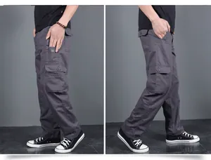 Side view of men's durable grey tactical cargo pants featuring multiple utility pockets.