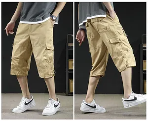 Men's khaki cargo 3/4 shorts with multi-pocket design and relaxed fit