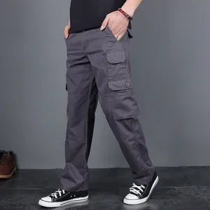 Men's grey multi-pocket tactical cargo pants featuring durable fabric and loose fit design