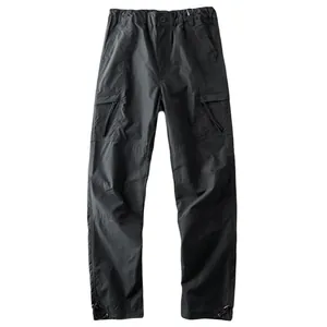 Men's waterproof tactical cargo pants in black for outdoor hiking, trekking and climbing