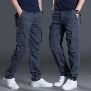Professional studio shot of men's loose cotton cargo pants with multiple utility pockets