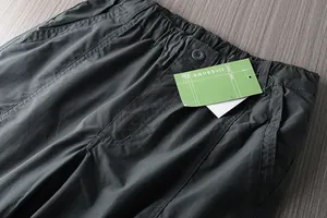 Close-up detail of men's quick-dry hiking pants with elastic waistband and pockets