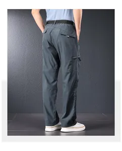 Detailed back view of men's loose fit quick-dry outdoor cargo pants in dark grey finish
