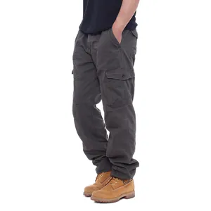 Side detail view of men's loose fit pure cotton cargo pants with functional pockets