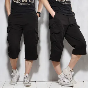 Stylish men's black cargo cropped pants featuring multi-pockets for outdoor casual activities.