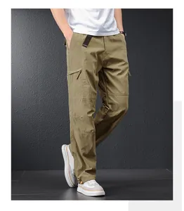 Detail view of men's khaki quick-dry cargo pants with loose fit design