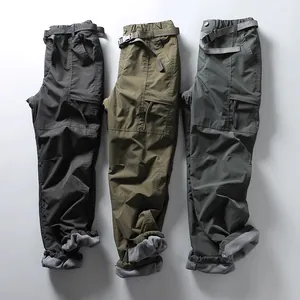 Close-up showing the warm fleece lining of men's tactical cargo pants