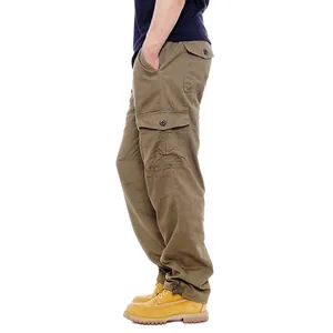 Side view of men's loose fit cotton cargo pants featuring multiple large functional pockets