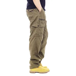 Side view of olive green cotton cargo pants with multiple functional pockets
