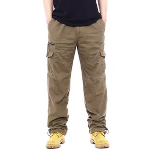 Front view of men's olive green cotton cargo pants with multiple utility pockets and elastic waist