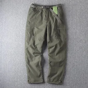 Full view of men's outdoor winter fleece cargo pants with multi-pockets and belt