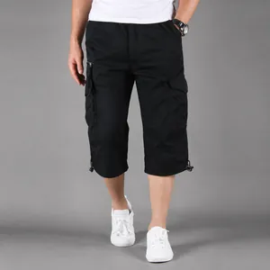 Men's black cargo capri shorts with multiple pockets and loose fit design