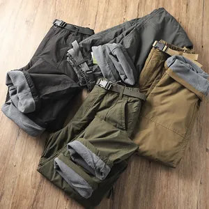 Pantaloni cargo outdoor impermeabili da uomo con spessa fodera in pile in colori assortiti.