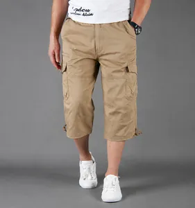 Men's khaki cargo capri shorts with multiple pockets and a comfortable loose fit.