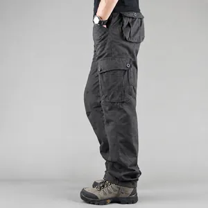 Side view of men's dark grey multi-pocket cargo pants in a loose straight fit for casual wear