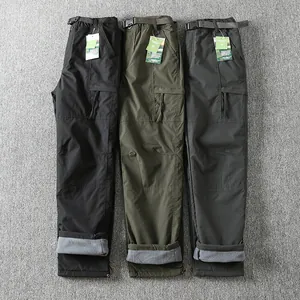 Three colors of men's waterproof windproof fleece-lined softshell cargo pants.