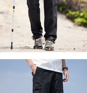 Detail der schwarzen Outdoor-Cargohose mit Taschen und schnelltrocknender Textur