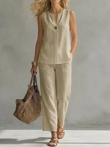 Women's elegant sleeveless beige linen two-piece set with wide-leg trousers for summer