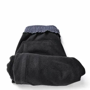 Professional thickened black outdoor hiking pants with warm polar fleece lining for winter.