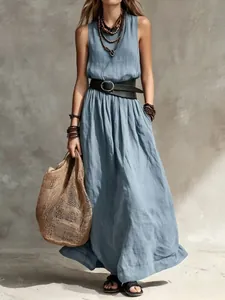 French style sleeveless blue linen maxi dress with layered necklaces and black waist belt
