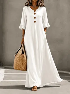 Women's white V-neck maxi dress with button details and ruffled sleeves