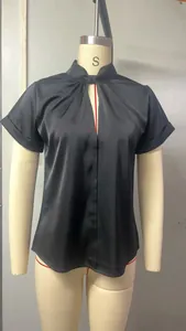 Elegant black satin short-sleeved blouse with keyhole neckline and gathered detail.