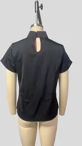 Back view of a slim fit black satin blouse with a keyhole opening and high neck.