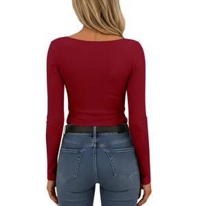 Back view of burgundy ribbed knit long sleeve T-shirt for women in slim fit style