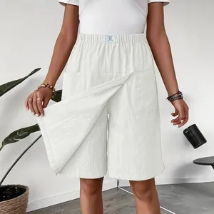 Stylish high-waisted white cotton-linen skort shorts for women with elastic waist and pockets