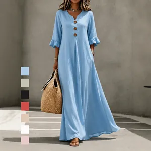 Elegante vestido largo azul claro con cuello en V, mangas con volantes y botones