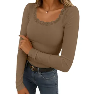 Detail view of square neck lace trim and ribbed texture on brown long sleeve knit top