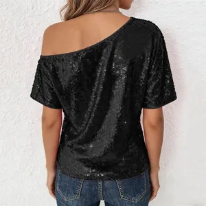 Back view of a black sequin off-shoulder top showing detailed shimmering texture