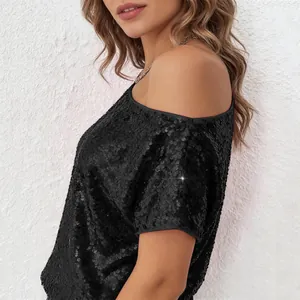 Close-up of black sequined off-shoulder top for women in casual loose fit