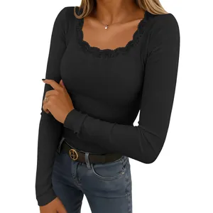 Close-up of black ribbed long sleeve top featuring delicate lace trim square neck